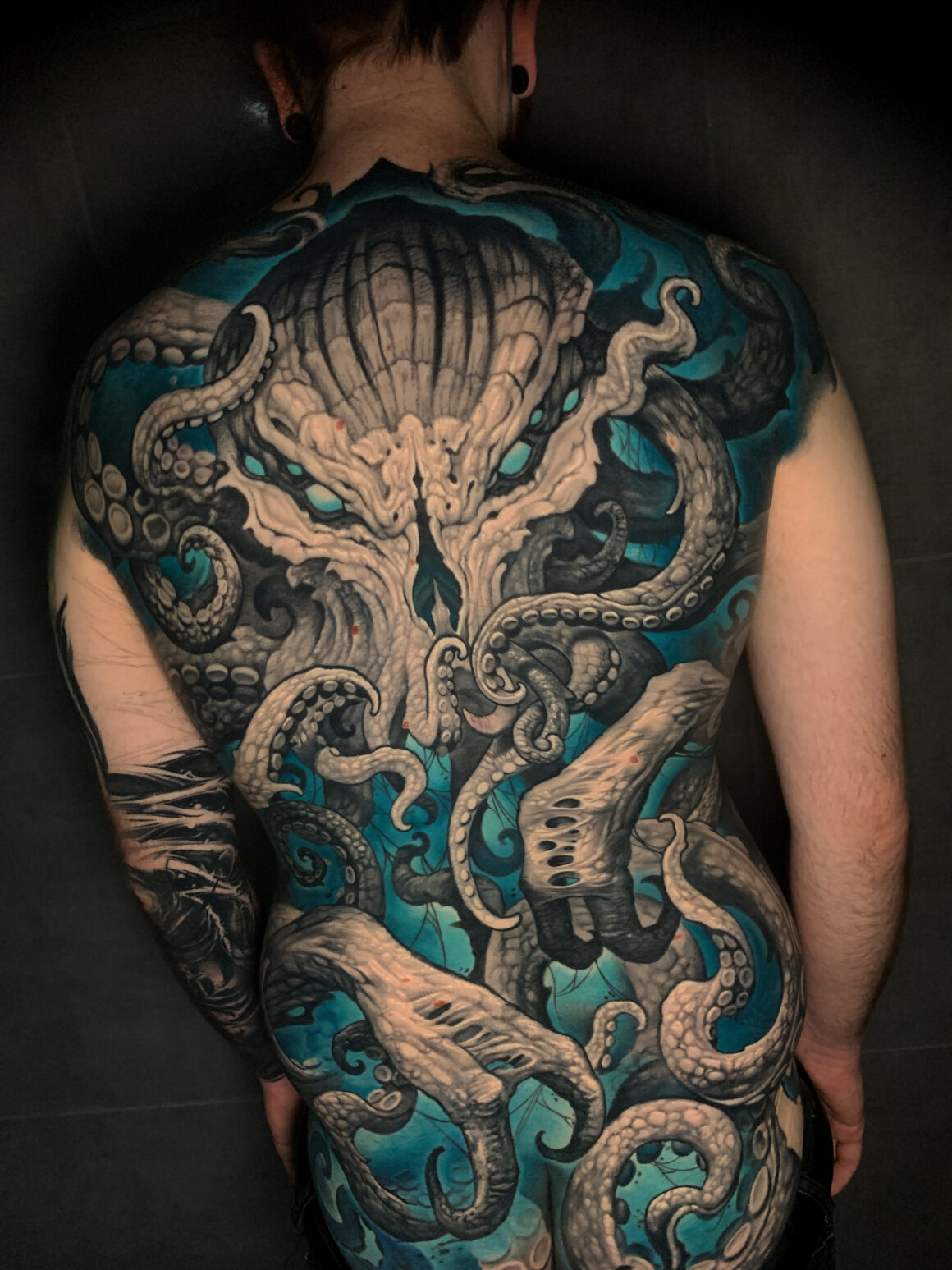 kraken back tattoo