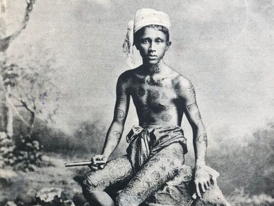 Photo postcard displacing tattooed Burmese villager, first decade of XIX century, from the private collection of Gabriele Gori