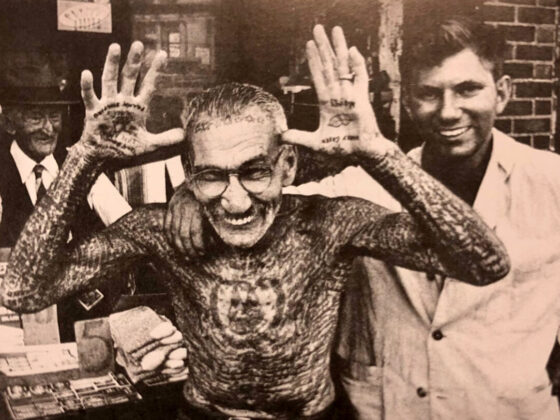 Stanley Moscowitz with Dick Hyland on t he Bowery, c. 1955, photo taken from “New York City Tattoo “The Oral History of an Urban Art”, by Michael McCabe