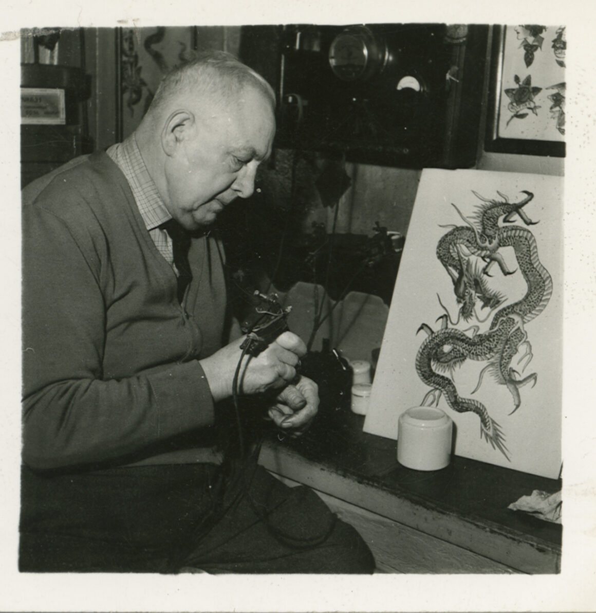 Christian Warlich in the separate tattoo area of his pub in Hamburg St. Pauli, c. 1960