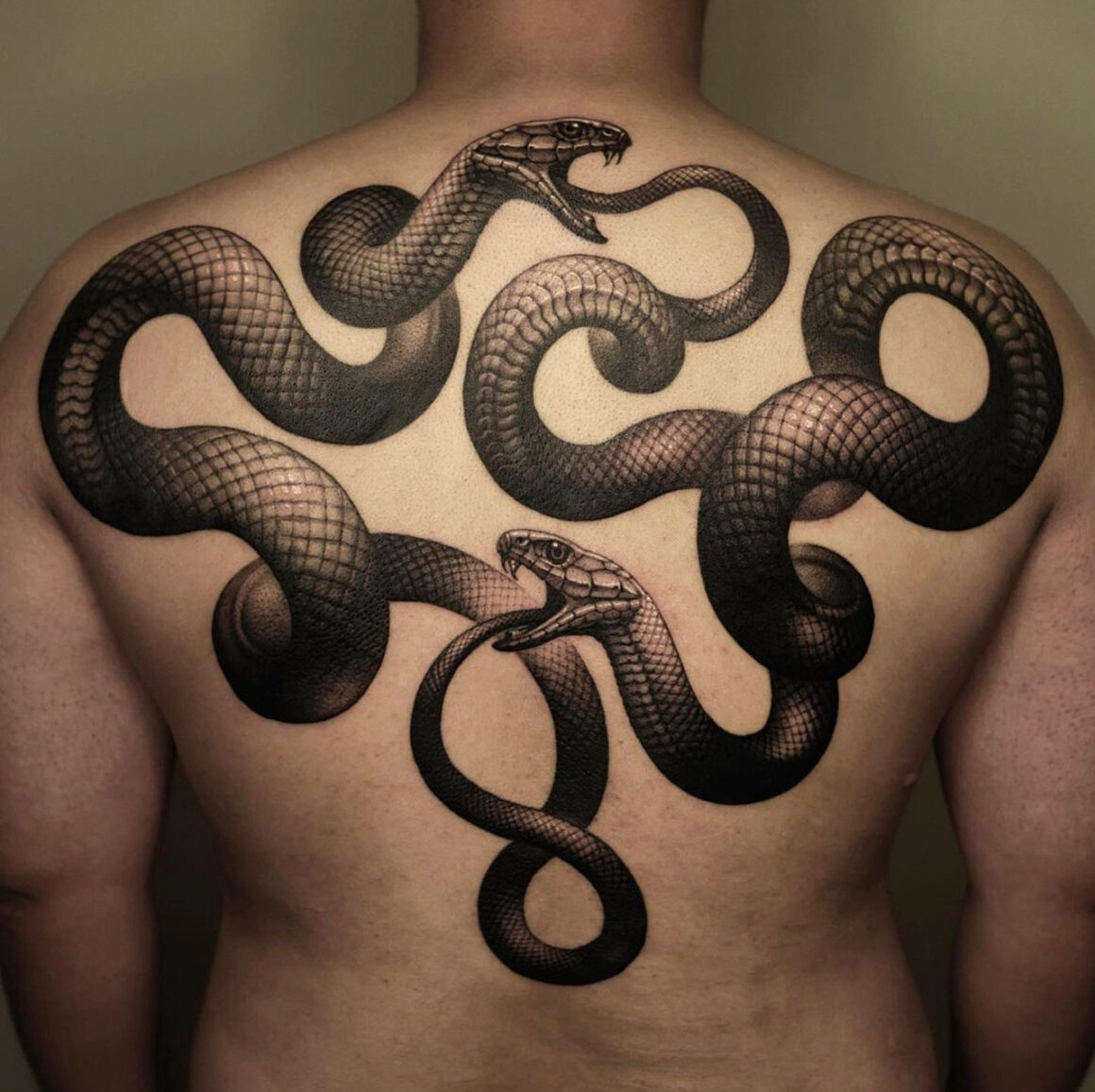 The changing skin of the snake - Tattoo Life